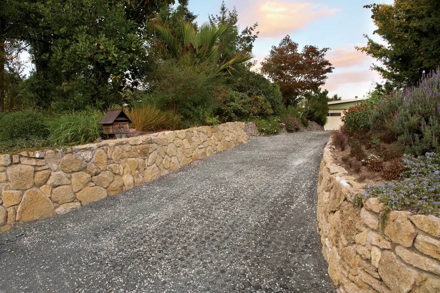 Building a gravel driveway on sloped land: A complete guide - Strol